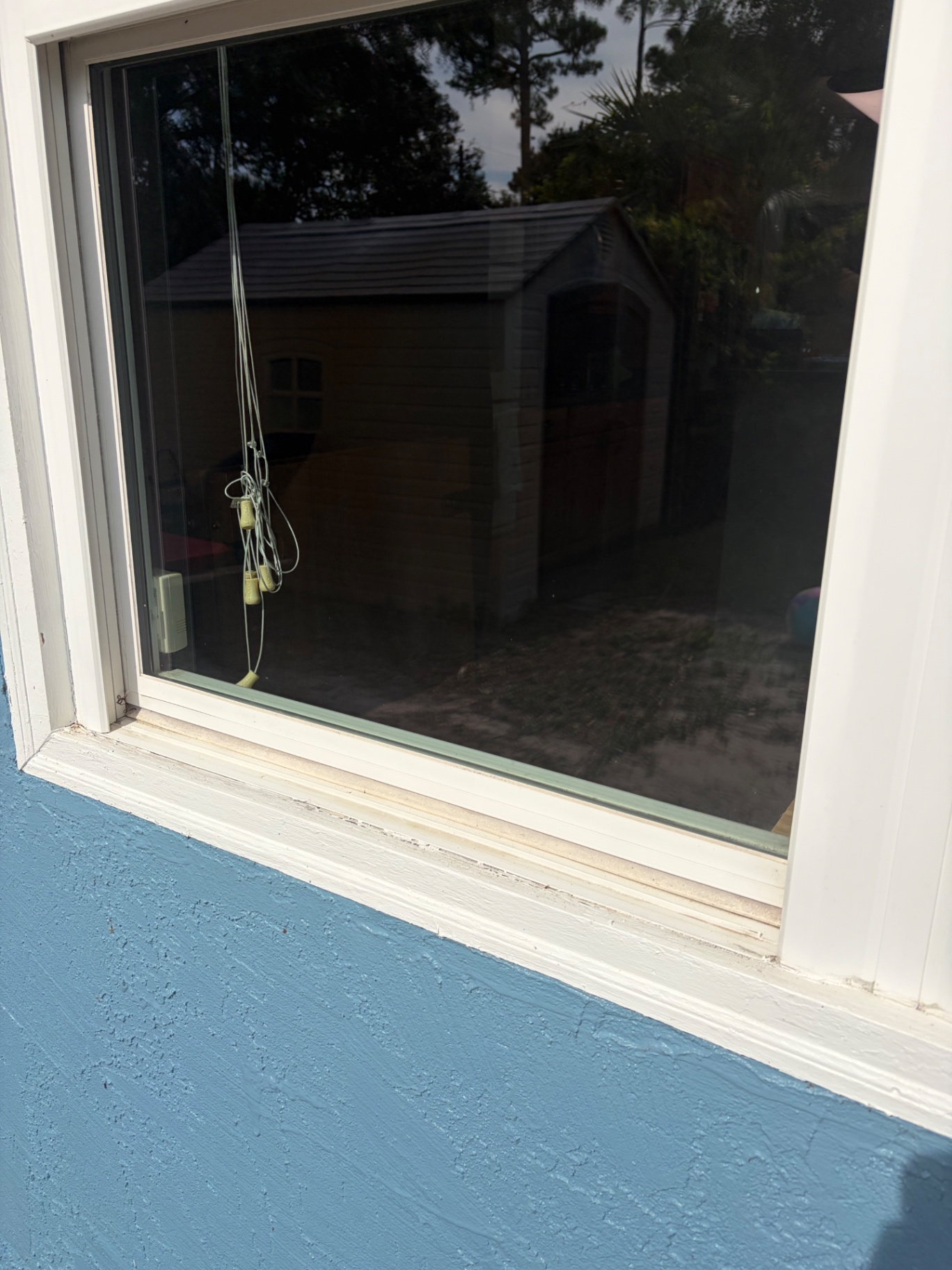 After: streak-free glass and clean sill on the same Navarre window