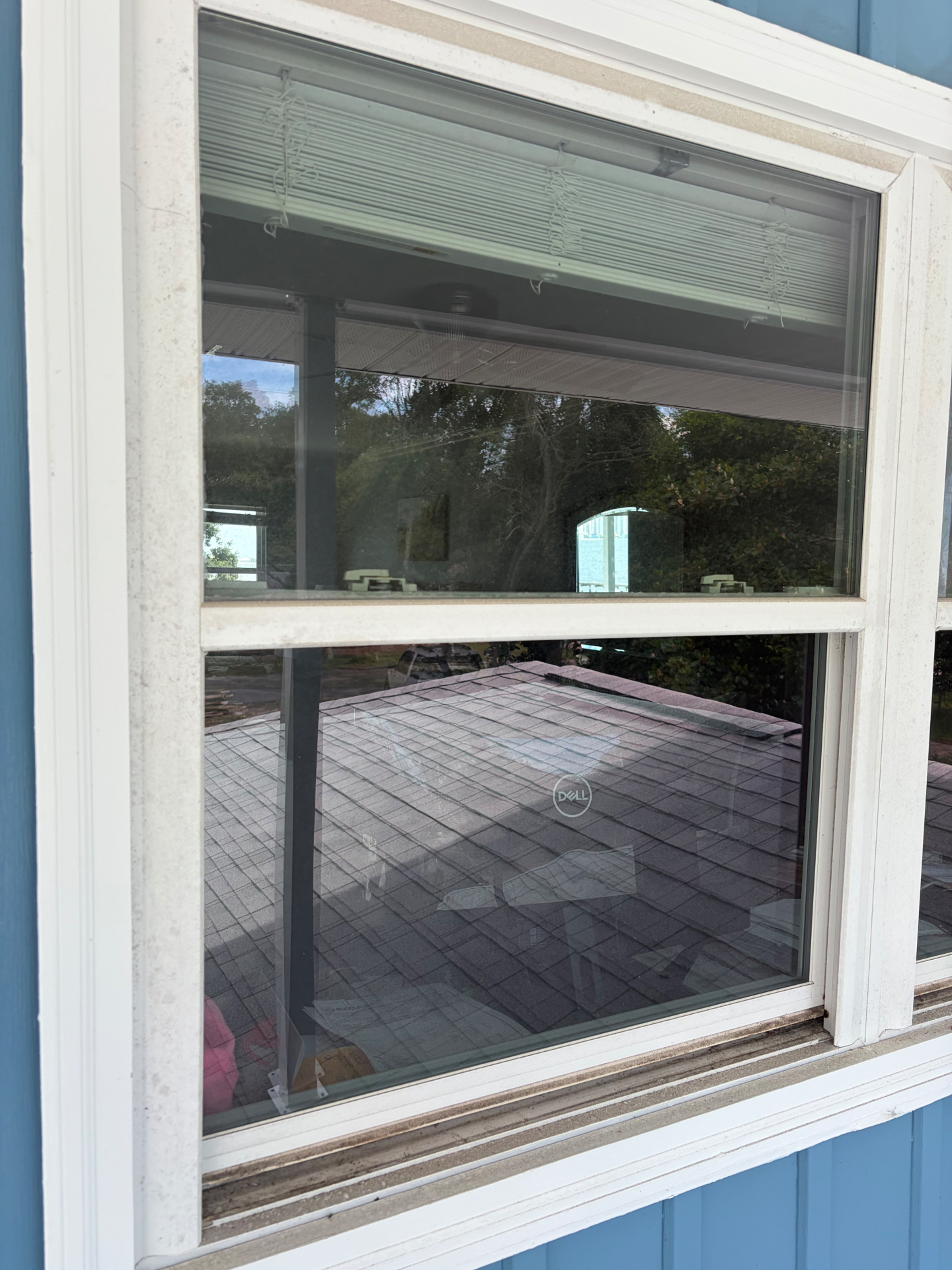 Before: upper Navarre window coated in salt spray and buildup